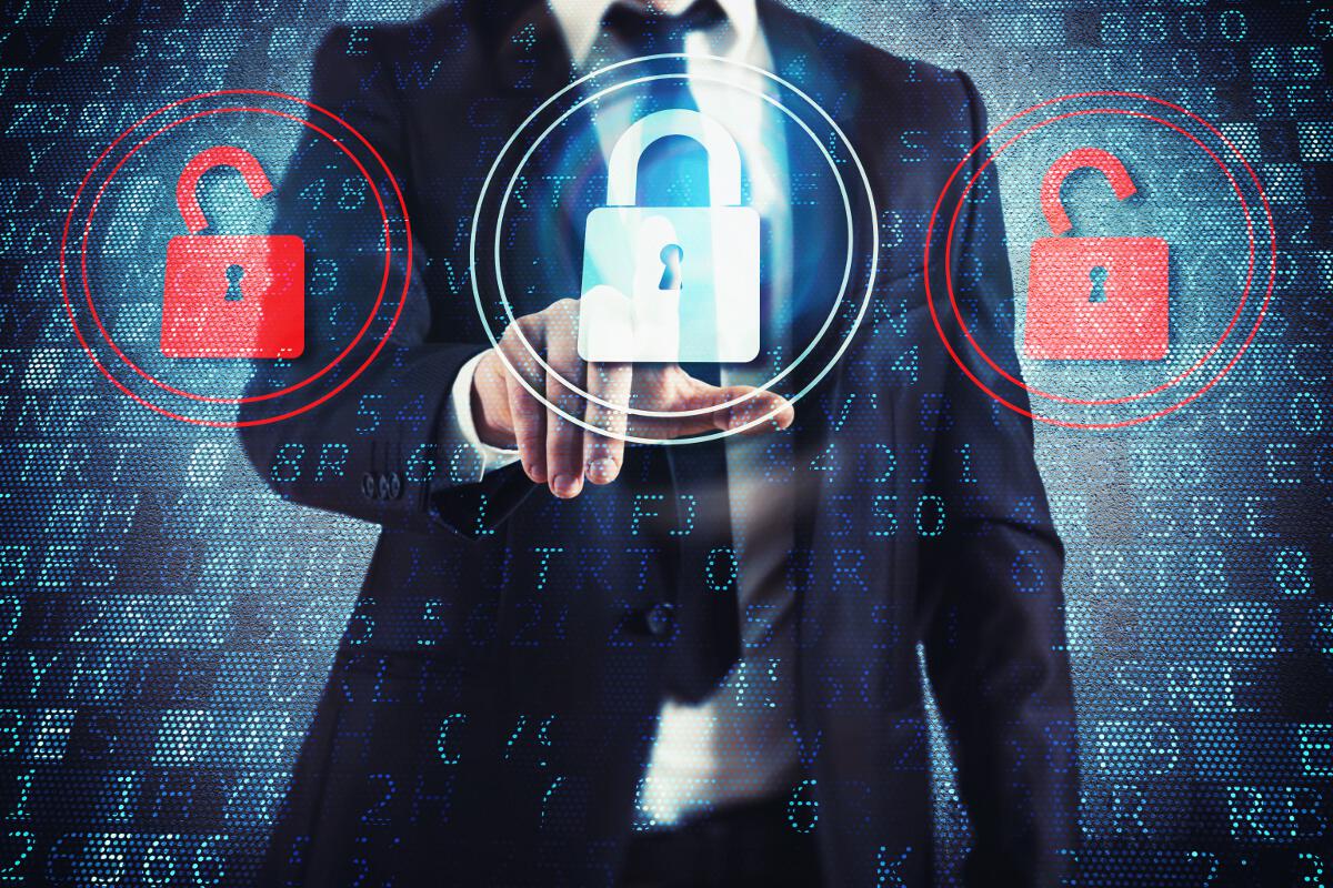 Businessman Selecting Closed Padlock Between Two Open Locks