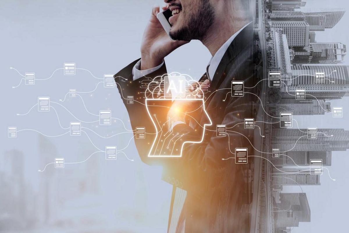 Businessman on a phone beside an AI head outline linked to floating documents.